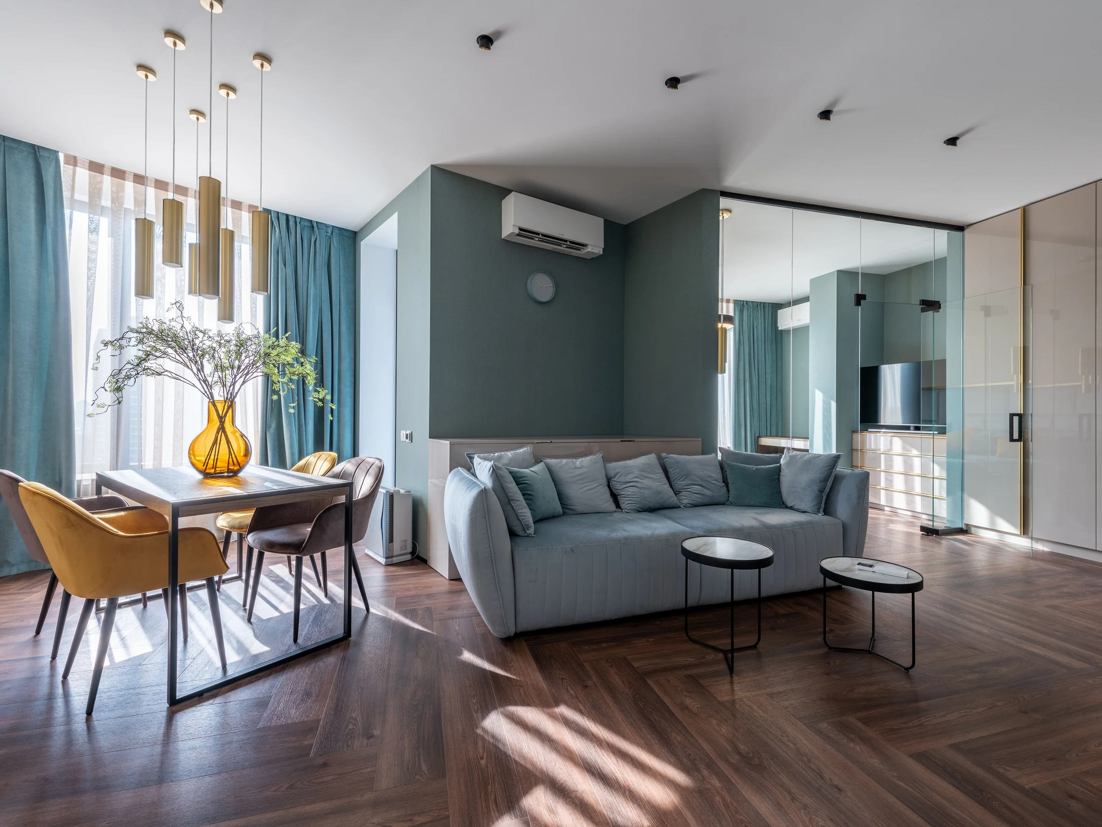 Contemporary living room with glass partitions